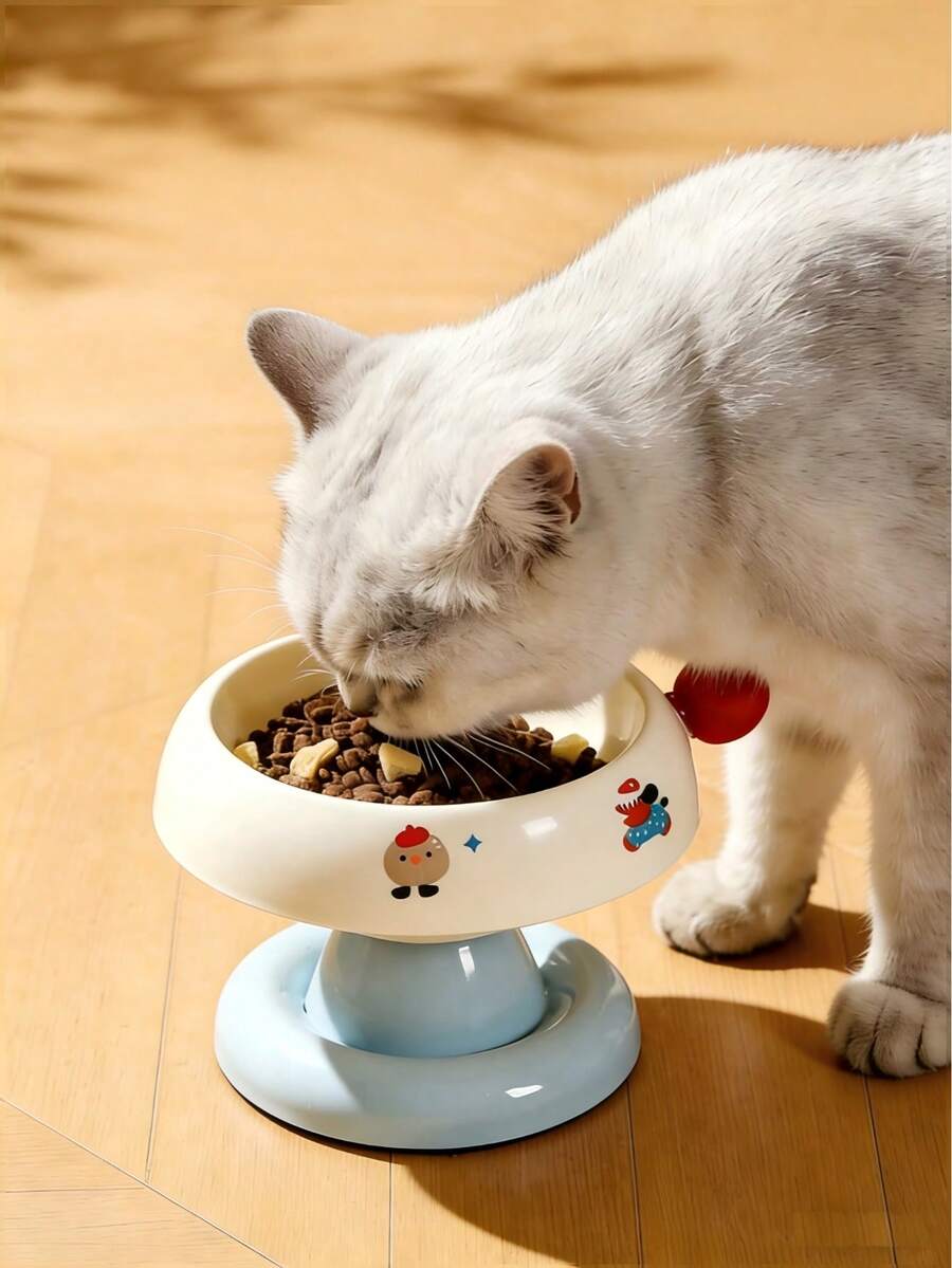 Tazón de comida elevado para mascotas con revestimiento de acero inoxidable y antideslizante, estilo de dibujos animados lindo adecuado para gatos y perros - Gran capacidad - Ver 1