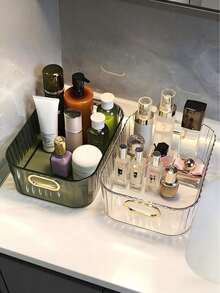 Transparente Acryl Schreibtisch Aufbewahrungsbox (funktioniert auch als Mehrzweck Aufbewahrungskorb) mit Goldrand, geeignet zum Organisieren von Kosmetik, Hautpflegeprodukten, Gesichtsmasken, Snacks, Wohnheim-Essentials und verschiedenen Haushaltsgegenständen - Verschiedenfarbig - Übersicht 2