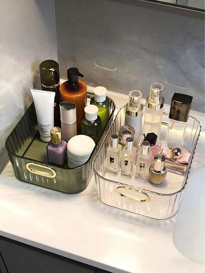 A Transparent Acrylic Desktop Storage Box, Multi-Functional Storage Basket, With Gold Decorative Trim. This Storage Box, Organizer, Desktop Organizer, And Plastic Organizer Can Hold Cosmetics, Skincare Products, Face Masks, Snacks, Dormitory Clutter Organizer, And Household Items. Suitable For Storing And Displaying Cosmetics, It's Ideal For Bathrooms, Kitchens, And Bedrooms. Also Suitable As A Bathroom Accessory.
