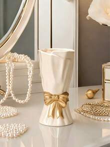 这款波西米亚风多功能蝴蝶结花瓶是家居装饰的理想之选，适合摆放在架子、桌子或客厅中。（实物尺寸略小，请在购买前注意） - 1PC - 查看 2