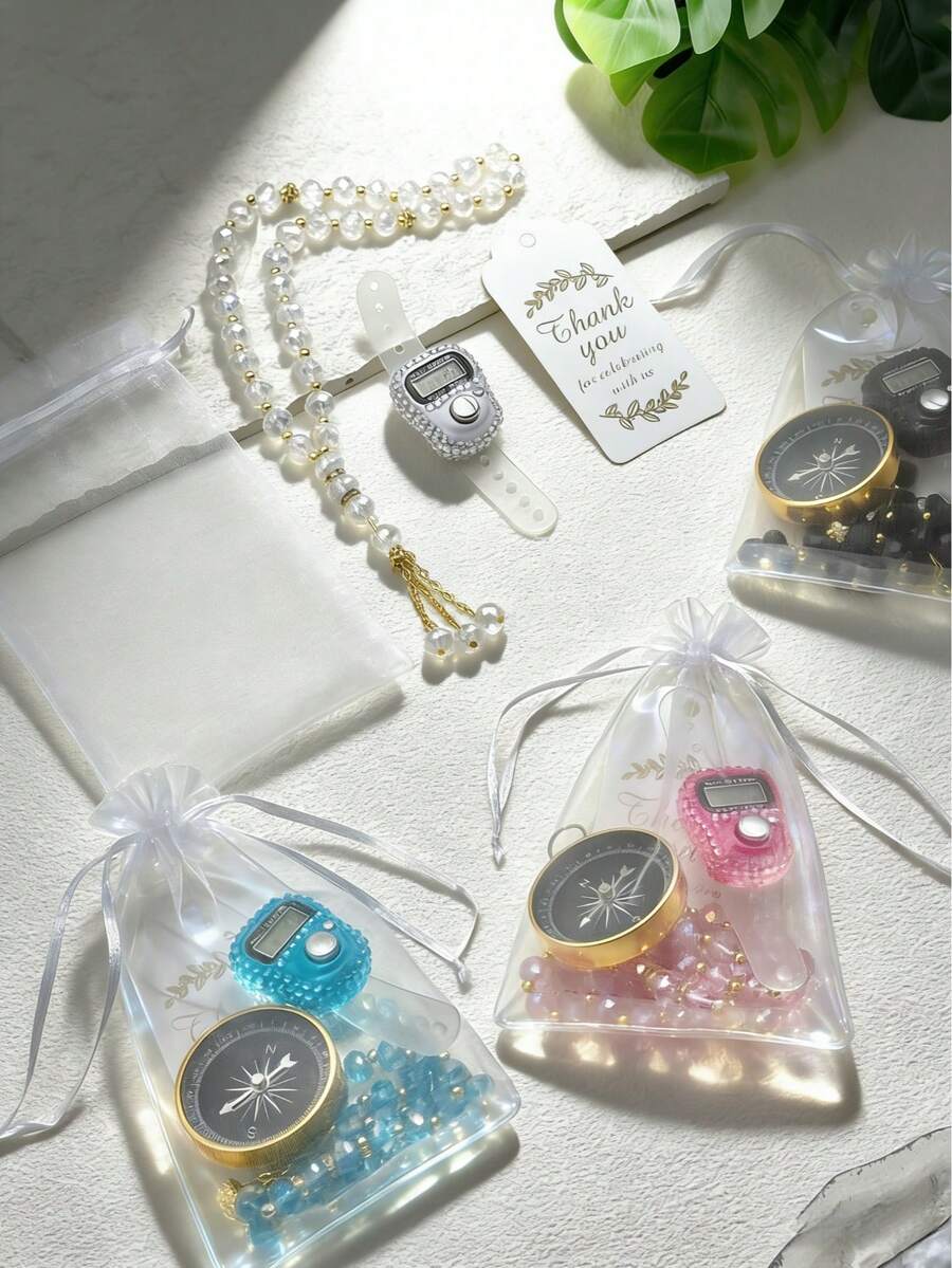 一套优雅白色欧根纱礼品袋，内含闪亮水晶珠计数器+指南针+33颗水晶珠，可用于日常祈祷/指引/计数，是斋月/婚礼必备礼物，也可用于念诵赞词/记念计数器。 - 水晶點鑽款 - 查看 1