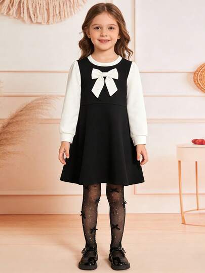 1 đôi tất lưới đính đá, tất lưới khoét lỗ nhiều màu sắc cho bé gái kèm nơ trang trí.