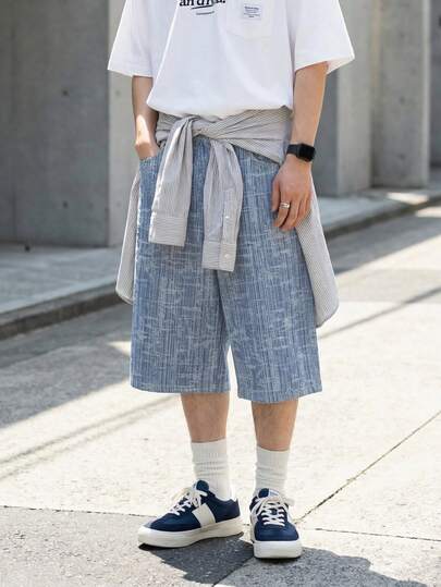 1件美式时尚前卫条纹提花宽松阔腿牛仔裤，休闲商务牛仔短裤，适合春夏日常穿着，七分裤长，居家及日常穿着皆宜。