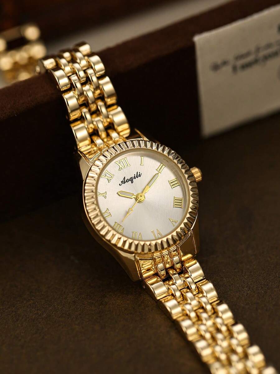 这款金色圆形女士石英表，设计时尚优雅，是日常佩戴的理想之选，也是生日和毕业礼物的完美选择。 - 金色 - 查看 1