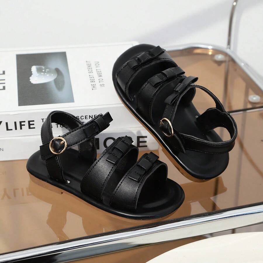 1双黑色软皮幼儿/小女孩平底凉鞋，圆头蝴蝶结，可调节鞋带，防滑软底，适合3-12岁女孩，日常、海滩穿着，2026春夏款 - 黑色 - 查看 1