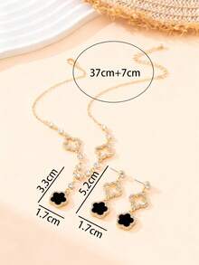 一套优雅奢华镂空水钻四叶草吊坠项链耳环首饰套装（女士款） - 黑色 - 查看 2