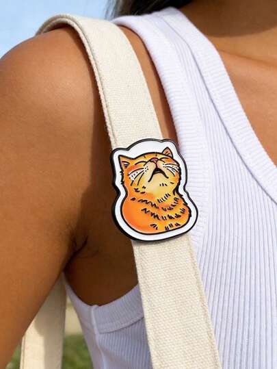 QIHOO 1 pieza Broche de esmalte de gato naranja "AWOO" lindo y gracioso con gato aullando de dibujos animados, broche de gatito acostado de dibujos animados, insignia de autocuidado, broche de metal de moda para solapa, mochila, ropa, joyería, bolsa, imperdible, regalo de graduación
