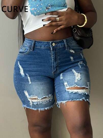 新款中腰弹力破洞流苏下摆修身大码女式牛仔短裤休闲