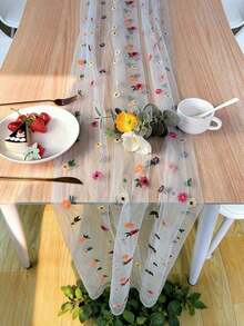 1Pc This Embroidered Table Runner Features Colorful Small Flower Patterns On A Semi-Transparent Mesh Fabric,Creating A Simple And Fresh Style. The Floral Pattern Makes This Sheer Table Runner Suitable For All Seasons,And It's Perfect For Decorating Dining Tables In Bedrooms,Living Rooms,Parties,And Weddings. - 11.81*70.87 英寸 - 查看 3