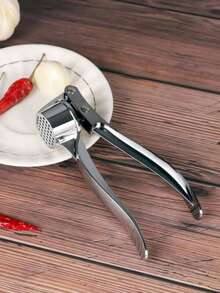 一款高品质、便捷小巧的压蒜器——兼具切蒜和压姜功能，易于清洁，经久耐用，适合日常烹饪。 - 彩色 - 查看 8