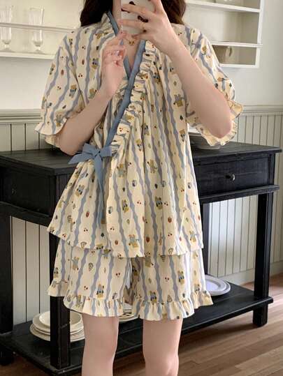 Bộ đồ ngủ nữ 2 món, áo khoác cardigan cổ chữ V, thiết kế thắt eo, áo tay ngắn in họa tiết trái cây và động vật, phong cách Hàn Quốc giản dị, thoải mái và thời trang, phù hợp cho mùa xuân, thu và đông.