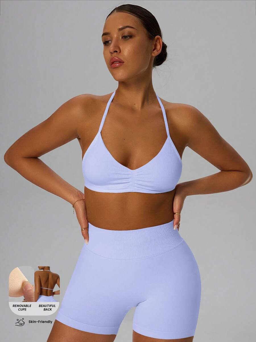 Áo hai dây thể thao nữ hỗ trợ cao, kiểu dáng mảnh mai, thích hợp cho tập thể dục, yoga và các môn thể thao khác. Đặc điểm nổi bật là khả năng nâng đỡ và độ co giãn cao, phù hợp cho thể thao, yoga và nhiều dịp khác nhau. - Màu tím - Xem 1