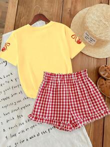 Bộ 2 món áo thun ngắn tay casual cho bé gái tuổi teen đi kèm quần short caro đỏ (cắt ngẫu nhiên), họa tiết anh đào, thiết kế trẻ thơ, mẫu mới mùa hè - Màu vàng - Xem 2