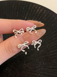 2pcs Fashionable Bow Decor Clip-On Earrings, Suitable For Women's Daily Wear And Accessorizing - Silver - View 2