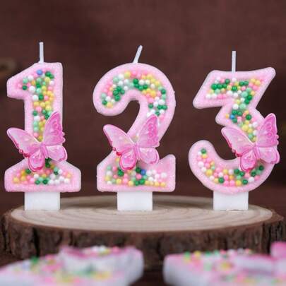 1 cây nến sinh nhật số, nến bánh kem trang trí hình bướm hồng từ 0-9, nến số chủ đề bánh macaron nhiều màu sắc, thích hợp cho các bé gái và phụ nữ nhân dịp kỷ niệm.