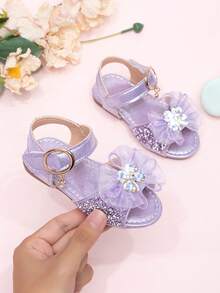 2026 Nuevas sandalias para niñas, zapatos de princesa para niños con lazo de strass, zapatos de playa para estudiantes de niñas pequeñas, verano - Morado - Ver 1