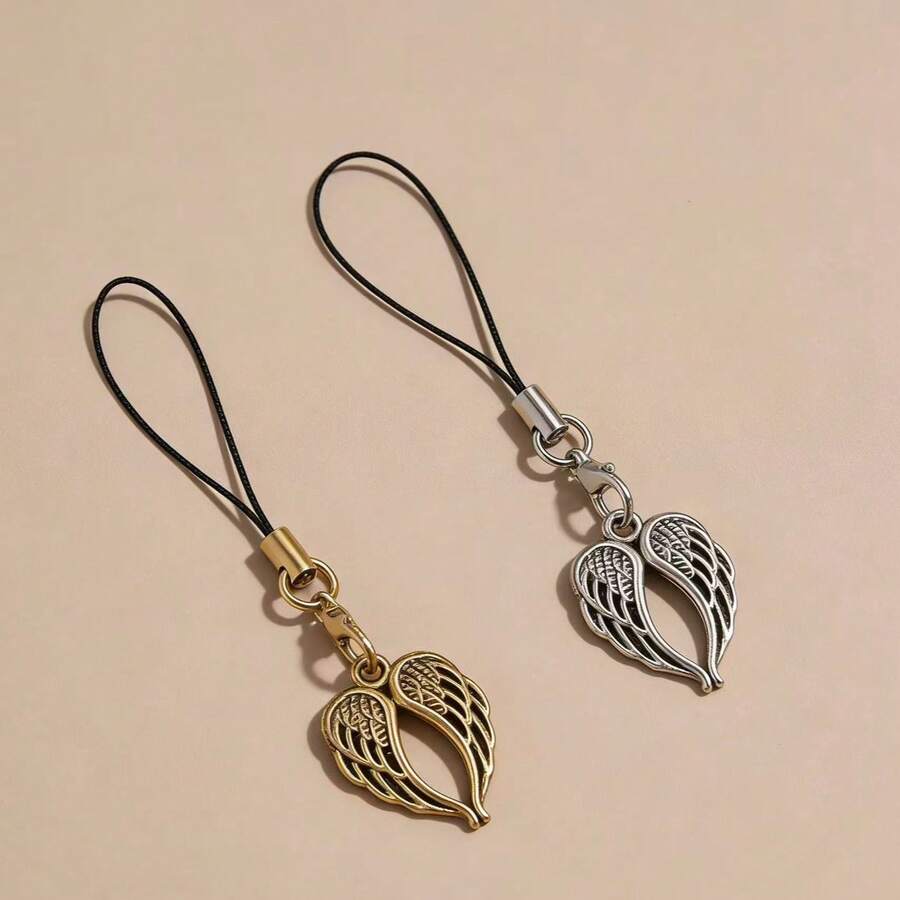 1/2 pezzi Charm vintage per telefono a forma di cuore con ali d'angelo, design delicato e traforato, adatto per smartphone universali, disponibile in 2 colori