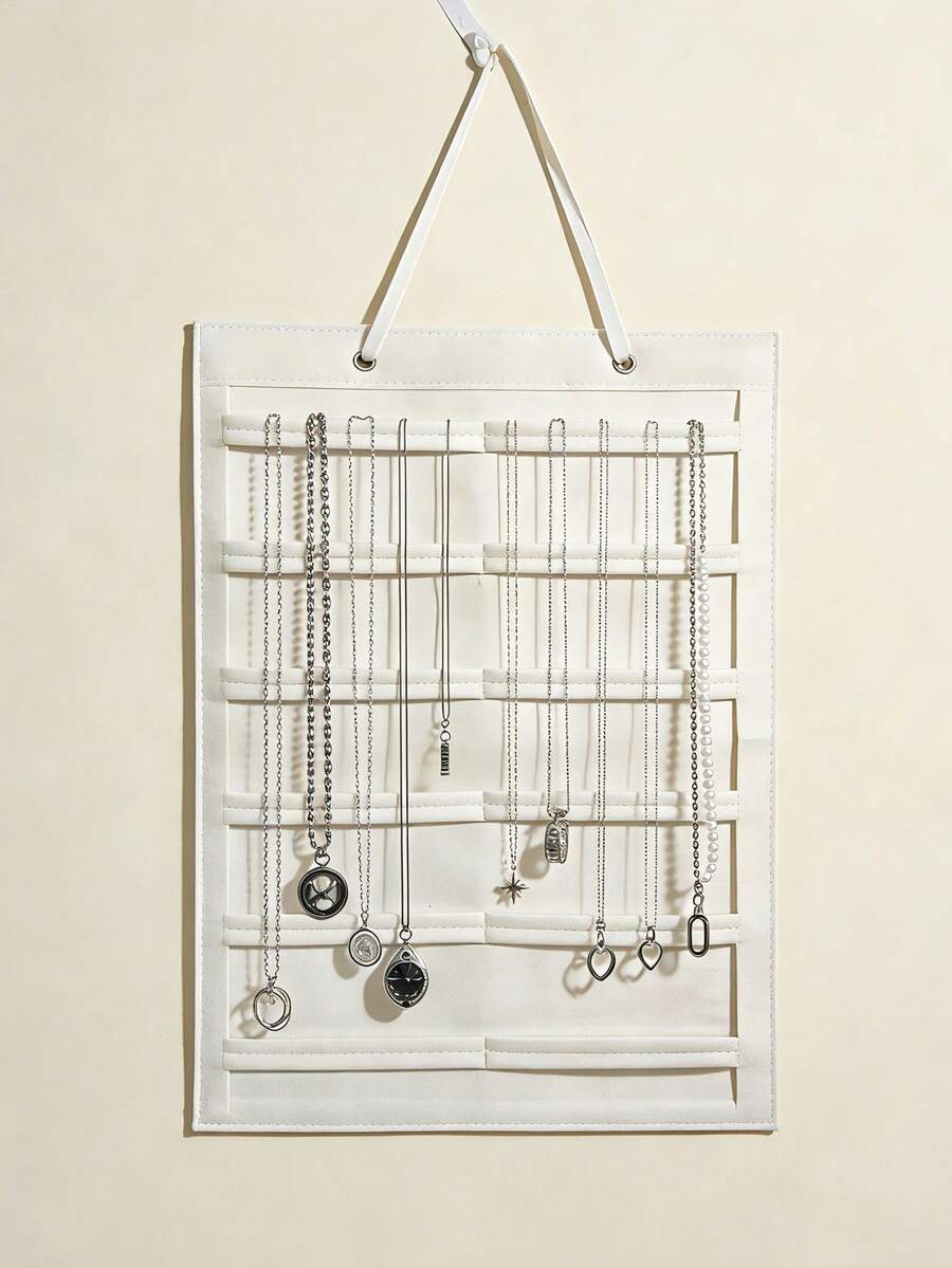 1 túi treo đựng trang sức dùng để sắp xếp dây chuyền, đồng hồ, vòng tay. - trắng - Xem 1
