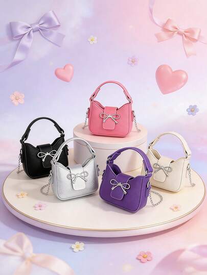 这款时尚甜美的迷你蝴蝶结手提包设计独特，配有链条肩带，可单肩背或斜挎。它适合各种场合，用途广泛，是户外活动、玩耍、通勤等的理想之选。也是送给青少年的完美礼物。