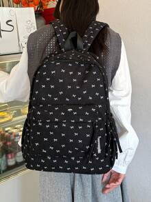 新款灯芯绒蝴蝶结印花女士背包，大容量休闲实用，是校园生活和学生使用的理想之选。适合上课、返校、户外活动或旅行。它不仅便于携带，而且容量大。 - 黑色 - 查看 4