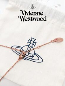 Vivienne Westwood Bộ sưu tập mặt dây chuyền Petra hình trái tim, mạ vàng hồng, chất liệu đồng thau. - Hoa hồng vàng - Xem 9