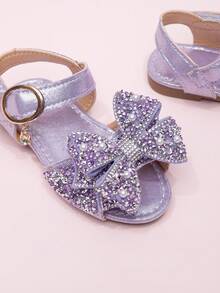 Giày sandal mới năm 2026 cho bé gái, giày công chúa cho trẻ em với nơ đính đá, giày đi biển cho bé gái học sinh, giày mùa hè. - Màu tím - Xem 5