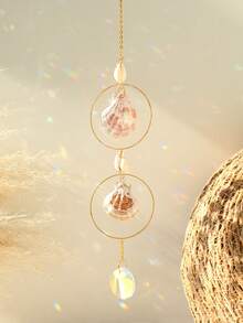 一件海岸贝壳装饰品，饰以闪亮水晶，波西米亚风格贝壳吊坠，金色边框，日月图案，适用于海滨别墅、客厅、卧室、浴室、海洋主题家居装饰、热带夏日氛围，是婚礼派对装饰、波西米亚风格房间装饰、海滨生活航海风装饰的完美之选，阳光反射效果极佳，是送给海滩爱好者的礼物，也适合度假租赁装饰，水晶贝壳悬挂装饰，是夏季家居和海滩婚礼的理想之选。 - 款式A - 查看 9