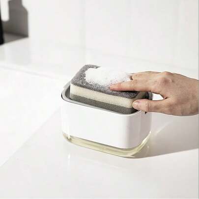 1个手动按压式海绵皂液器，厨房洗洁精分配器，一体式收纳设计，家庭清洁必备，适合家庭主妇、租房者、厨房爱好者，可用于日常洗碗和厨房收纳，实用家居用品，也是送给家人、朋友、乔迁之喜的贴心礼物。