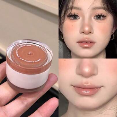 HER ORANGE Bálsamo multiusos para labios y mejillas HERORANGE, acabado transparente acuoso y mate. Tonos iluminadores, rubor natural y vitalidad para el maquillaje diario.