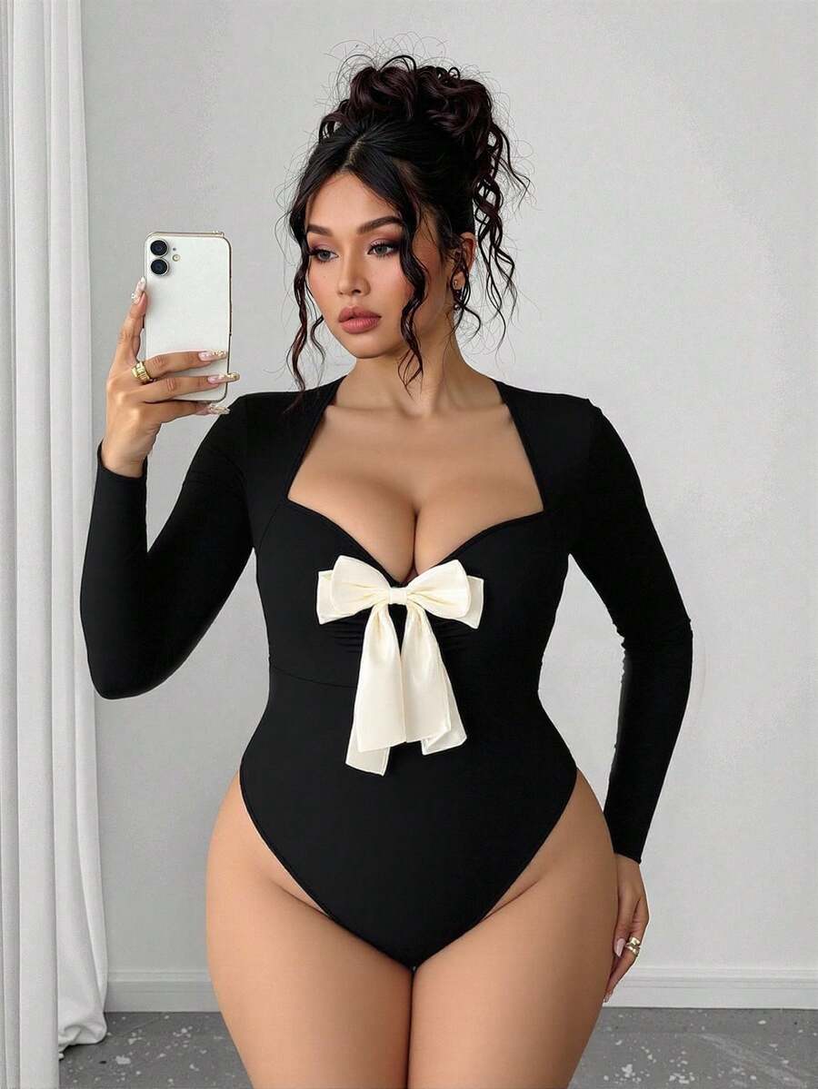 Áo liền thân dài tay bằng vải dệt kim thắt nơ dành cho nữ, màu đen. - màu đen - Xem 1