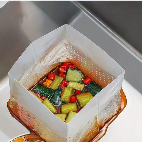 10个装垃圾袋，创意自立多功能厨房垃圾沥水袋，结实耐用，一次性使用，采用韧性良好的PE材质，可同时处理厨房垃圾和过滤废水。