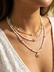 Bộ 3 vòng cổ hạt cườm hình vỏ sò và sao biển, thích hợp cho phụ nữ đi nghỉ mát và du lịch biển. - Nhiều màu - Xem 6