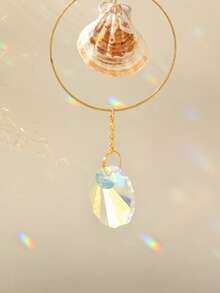 一件海岸贝壳装饰品，饰以闪亮水晶，波西米亚风格贝壳吊坠，金色边框，日月图案，适用于海滨别墅、客厅、卧室、浴室、海洋主题家居装饰、热带夏日氛围，是婚礼派对装饰、波西米亚风格房间装饰、海滨生活航海风装饰的完美之选，阳光反射效果极佳，是送给海滩爱好者的礼物，也适合度假租赁装饰，水晶贝壳悬挂装饰，是夏季家居和海滩婚礼的理想之选。 - 款式A - 查看 8