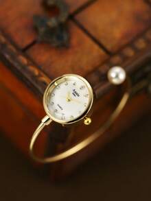 金色圆形手镯式女士石英表，时尚精致简约艺术设计，适合日常佩戴，亦可作为礼物赠送。 - 金色 - 查看 1