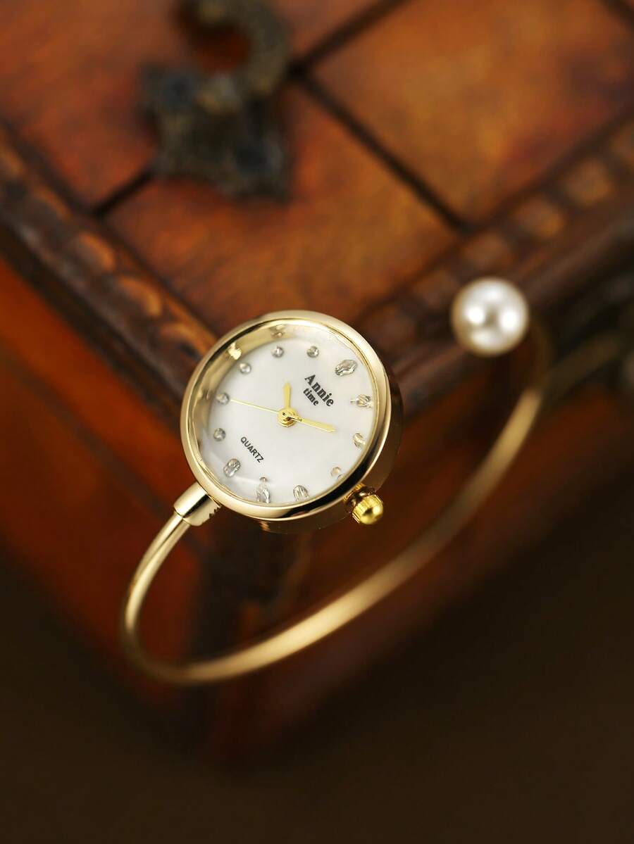 金色圆形手镯式女士石英表，时尚精致简约艺术设计，适合日常佩戴，亦可作为礼物赠送。 - 金色 - 查看 1