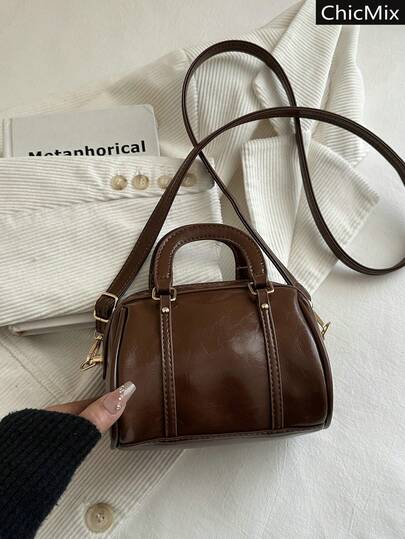 纯色百搭迷你简约优雅手提包，经典百搭纹理女士斜挎包，适合购物、装钱包、休闲出行，适合年轻女性、大学生、职场新人及白领人士。也非常适合办公室、大学、工作、商务、通勤、户外活动、旅行和郊游等场合。