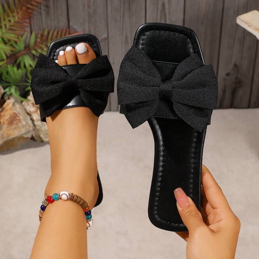 1 đôi sandal nữ đế bằng mũi vuông có nơ, kiểu dáng thoải mái, dễ mang. - màu đen - Xem 1