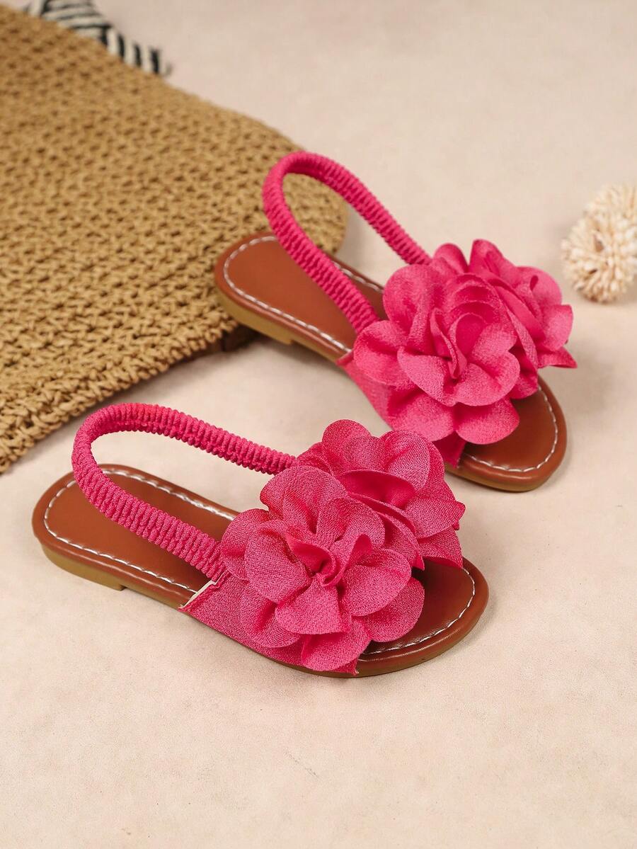 1 par de sandálias rasteiras pretas de tecido macio com estampa floral, bico redondo, elásticas, ideais para meninas de 3 a 12 anos, perfeitas para uso casual, praia, férias e verão de 2026. - Rosa Quente - Ver 1