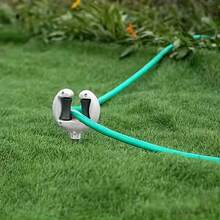 1个花园水管支架,水管导向器,户外植物浇水软管定位器。让您的花园水管整齐有序,防止缠绕。安装和使用简便,非常适合户外花园、草坪和植物浇水。是日常园艺和庭院维护的实用便捷工具。 - 彩色 - 查看 9