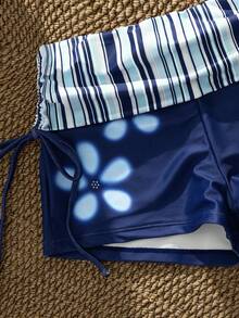 Bộ bikini 2 mảnh in hoa màu đỏ đậm bán chạy nhất mùa Xuân/Hè 2026, chất liệu co giãn, thiết kế gợi cảm và thời trang, mặt hàng bán chạy nhất cho kỳ nghỉ biển của nữ. - Xanh đậm - Xem 6