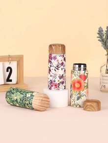 Cốc giữ nhiệt bằng thép không gỉ 316 họa tiết hoa cổ điển, dung tích 180ml, kích thước nhỏ gọn, nắp gỗ nguyên bản kết hợp với thân cốc họa tiết hoa nghệ thuật, giữ nhiệt lâu dài, giúp mỗi thức uống trở nên thanh lịch như đang ở trong một khu vườn. - Nhiều màu - Xem 11