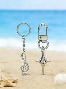 2 piezas de regalos creativos y prácticos - Llaveros de notas musicales de metal personalizados, pequeños colgantes publicitarios, anillos de llave con símbolo musical, eslabones de cadena, llaveros de estrella hueca de aleación de moda, colgantes. - Plateado - Ver 2