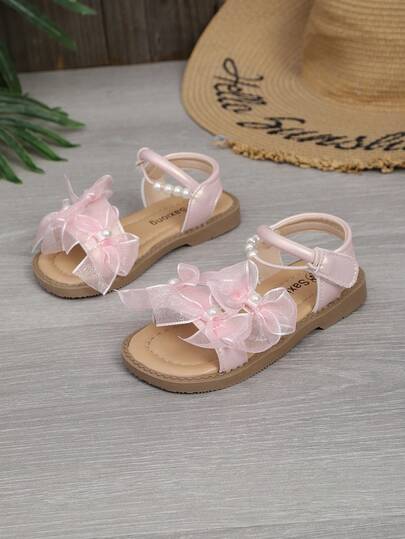 Giày sandal nơ ngọc trai mùa hè mới cho bé gái, giày công chúa thoải mái, mềm mại và thoáng khí.