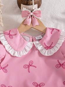 Bộ đồ mùa hè dễ thương cho bé gái: Áo tay phồng màu hồng cổ bèo nhún thắt nơ và quần ống loe cạp cao xẻ tà thắt nơ. - Hồng - Xem 7