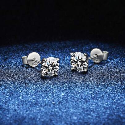 A Pair Of Sterling Silver Stud Earrings Set With Moissanite. Stylish, Classic, And Versatile, Perfect For Weddings And Parties.