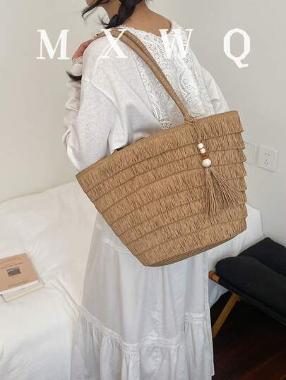 新款流苏草编手提包，大容量单肩包，休闲度假风编织包，简约百搭通勤沙滩包，流苏装饰复古水桶包，女士夏季沙滩旅行必备手提包