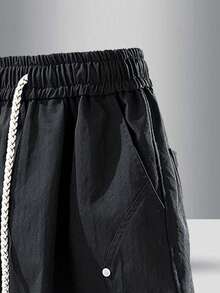 加大码男士夏季休闲纯色宽松短裤，铆钉装饰，侧边口袋，抽绳腰带，柔软舒适，适合户外活动 - 黑色 - 查看 4