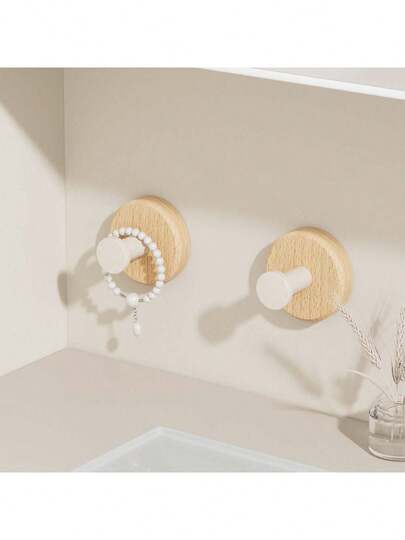 Minimalist Wooden Style, Suitable For Bedroom, Bathroom, Foyer And Other Scenes, Retaining Natural Wood Tone, No Excessive Pattern Design. Compact Hook Shape, Smooth Edges, Wall-Mounted Hooks Won't Damage Walls. Product Includes Strong Adhesive Bathroom Hooks, Hanging Clothes Rack And Wall-Mounted Wooden Hooks, Easy Installation Without Drilling.