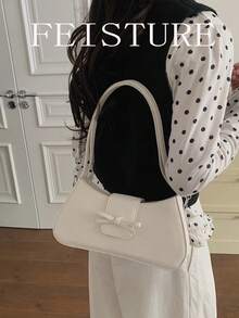 1个FEISTURE PU皮革蝴蝶结翻盖单肩包，时尚女士腋下法棍包，适合日常外出、约会、通勤。 - 白色 - 查看 9