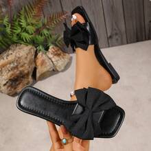 1 đôi sandal nữ đế bằng mũi vuông có nơ, kiểu dáng thoải mái, dễ mang. - màu đen - Xem 2